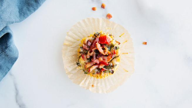 Chard, Herb & Bacon Egg Bites Served with Coconut, Berry, and Mango Salad